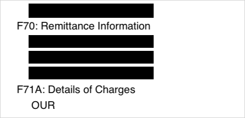 Field 71A, Details of Charges, set to OUR on a real MT103, the other fields blacked out